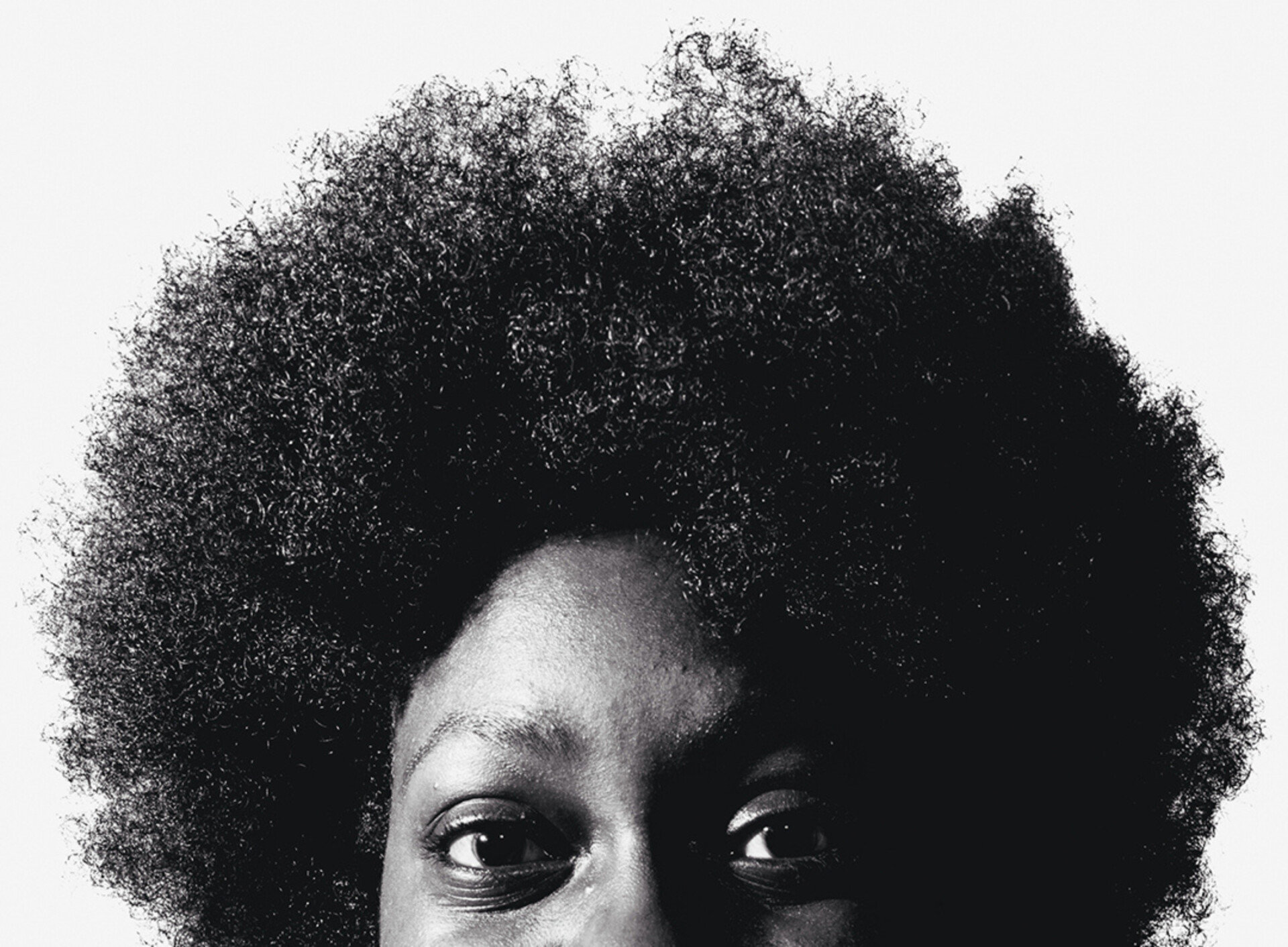 Keisha Thompson is pictured from the nose up with her afro out